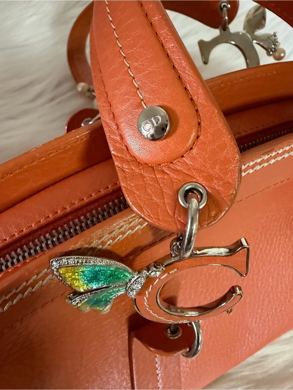 Dior Limited Edition Orange Leather Top-Handle Bag.